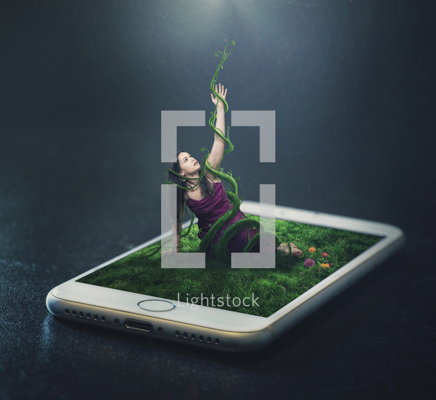 A woman trapped in vines from a cell phone