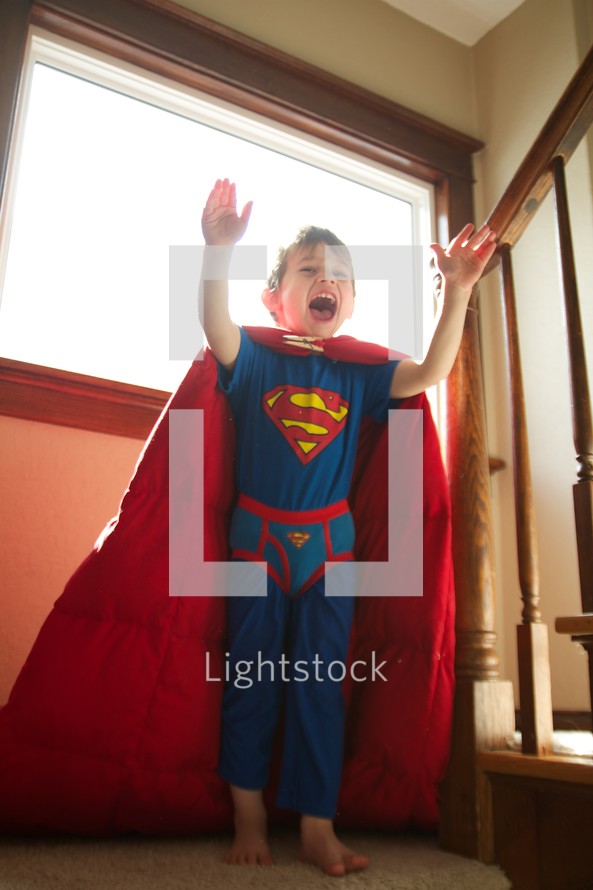 A boy in a superman costume 