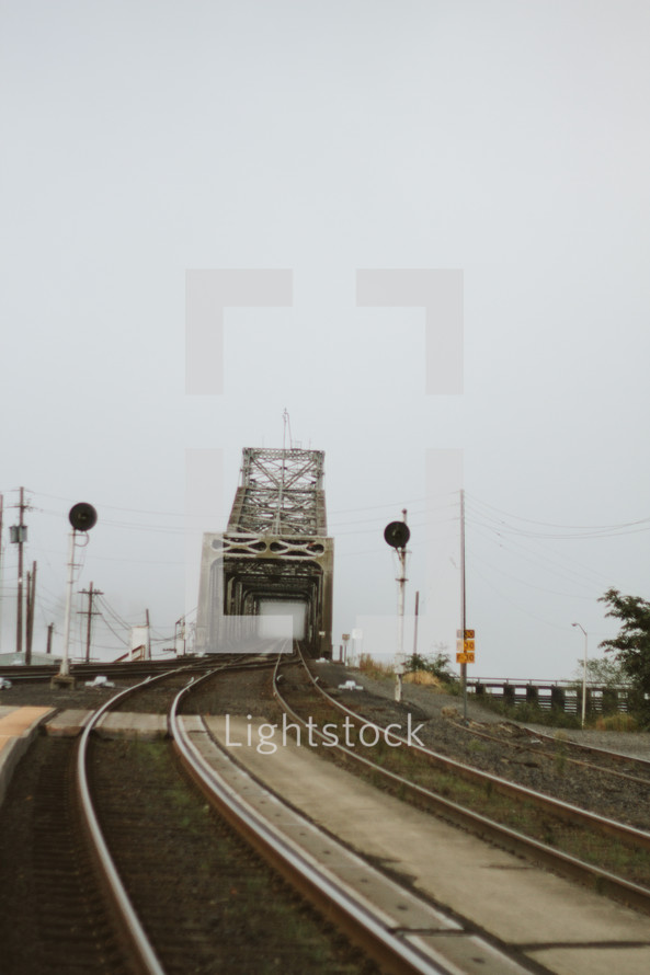 tracks and a railroad bridge tunnel 