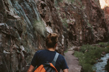 woman hiking a trail 
