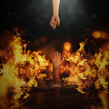 Jesus's hand and a hand reaching out of fire 