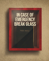 Holy Bible in an emergency glass box.