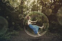 woman floating in a bubble 