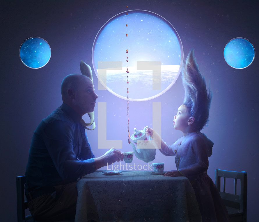 A father and daughter share a tea party in space