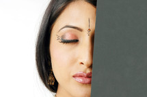 face of a woman with Bindi and closed eyes 