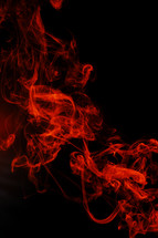 red smoke in darkness 