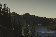 Trees and mountain around a lake