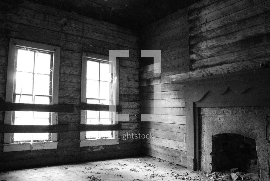 an empty room in an old abandoned house 