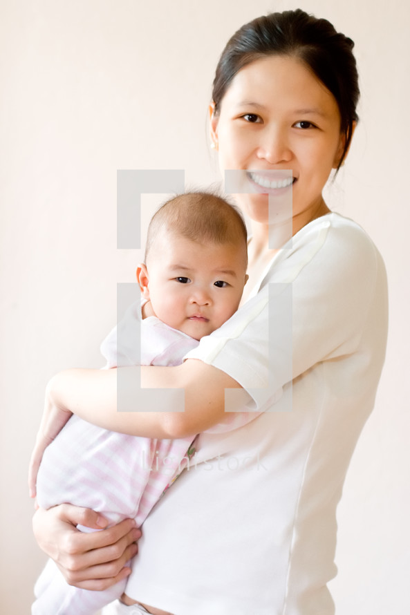 An Asian mother and her infant 