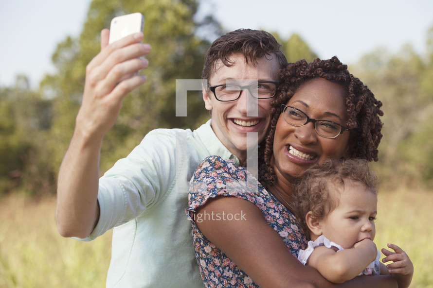 family taking a selfie 