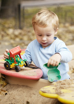 Boy playing with toy outdoor
