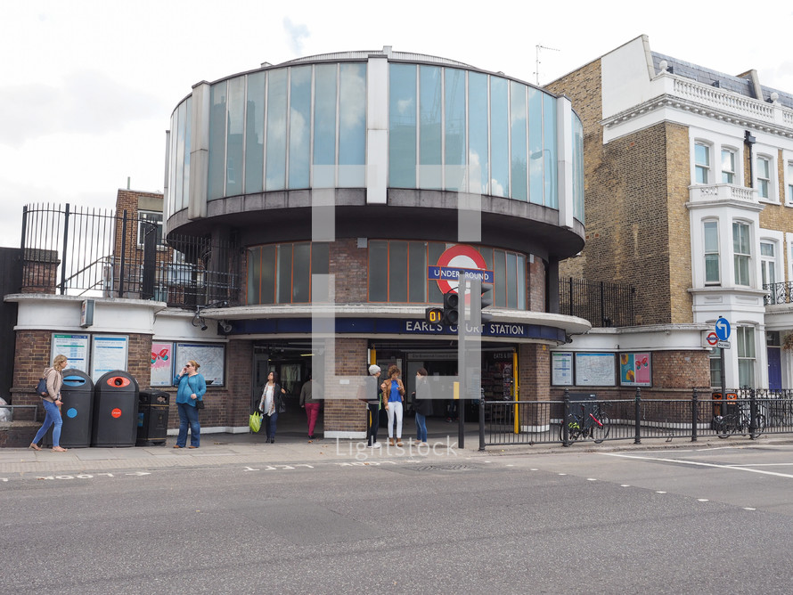 LONDON, UK - SEPTEMBER 27, 2015: Travellers at Earls Court London Underground tube station