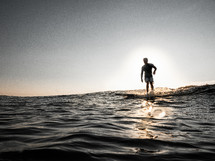 surfer at dusk 