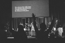 worshipers singing at a worship service 