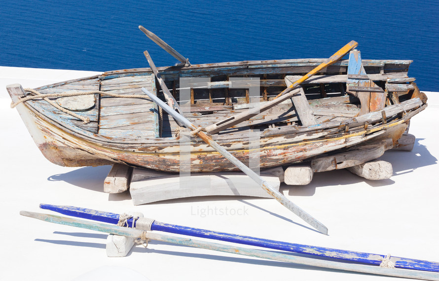 old boat on the roof Santorini village Firostefani