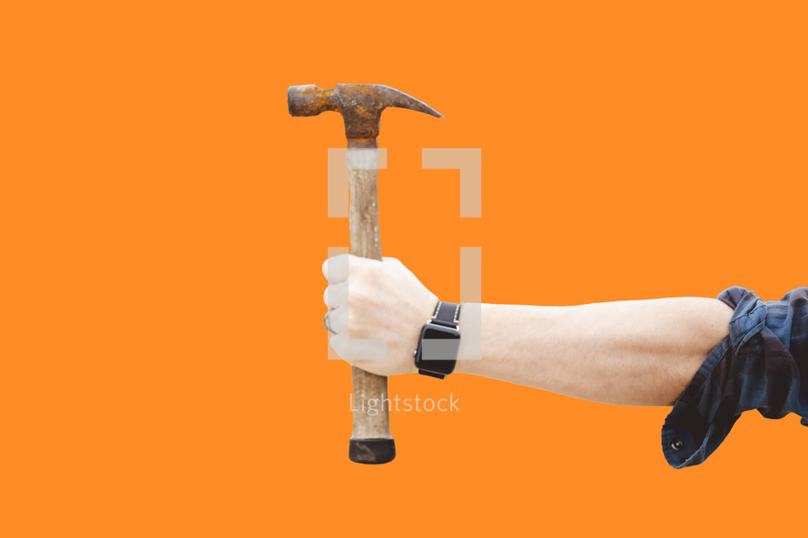 arm holding out a hammer 