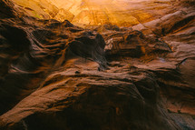 sunlight reaching a canyon bottom 