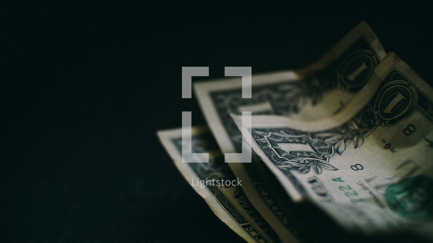 dollars on a black background 