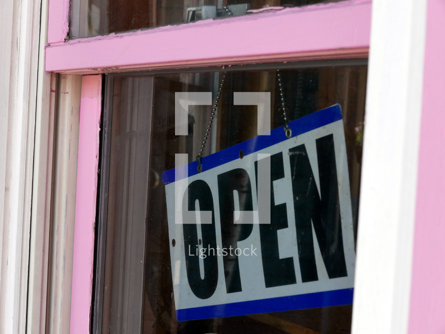 'OPEN' sign in a shop window 