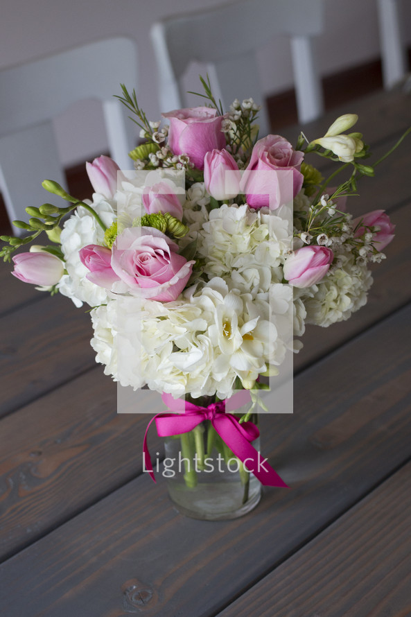 A bouquet of flowers in a vase.