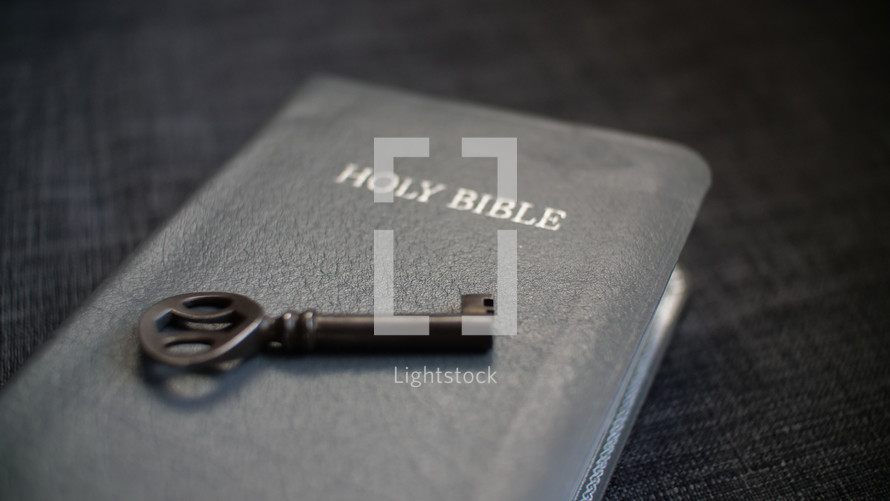 a key on a Bible 