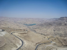winding road through a desert landscape 