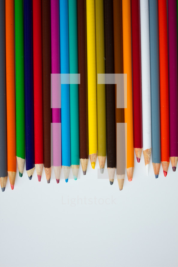 border of colored pencils 