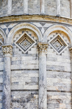 columns on a building in Pisa, Italy 