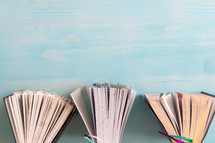 book spines border on wood background 
