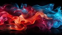 Abstract multicolored smoke on a black background.