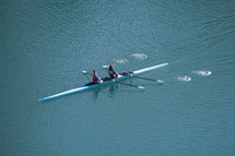 athletes training in canoe in the river