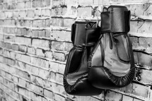 boxing gloves and a brick wall 