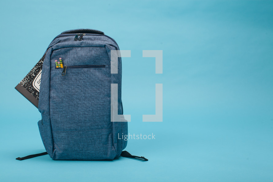 blue student book bag 