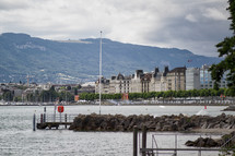 marina, jetty, and buildings along a shoreline in Switzerland 