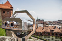 viewfinder telescope and view of city in Switzerland 
