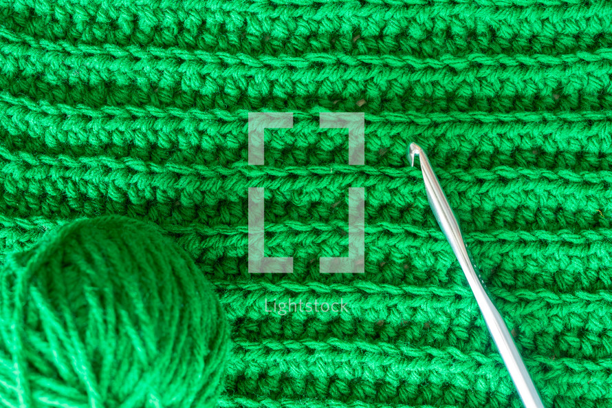 knitting green yarn 