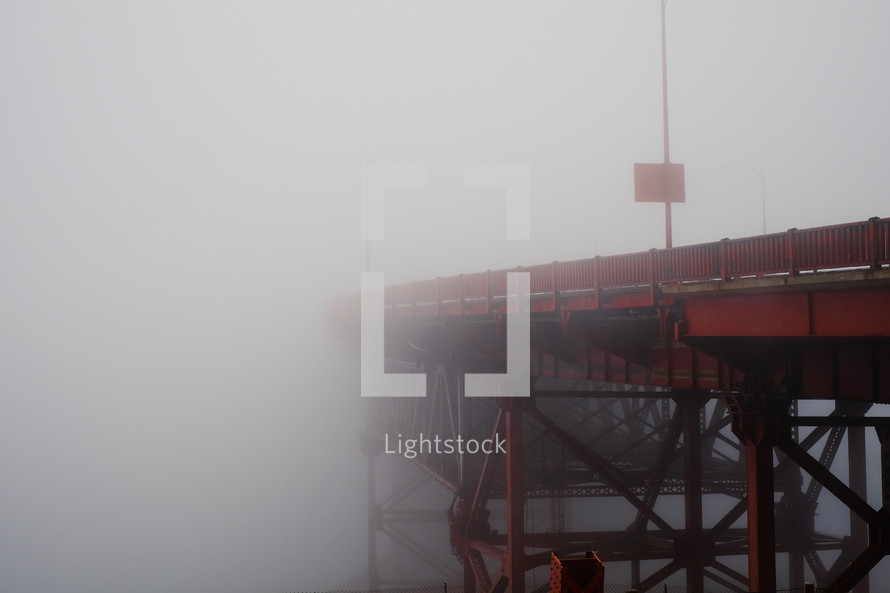 morning fog and a red bridge 