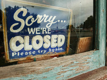 Sorry We're Closed please try again sign in an old building
