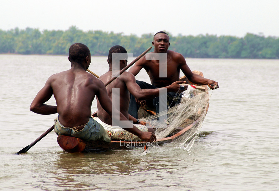 three men fishing on the Calabar River