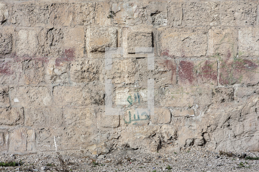 an exterior portion of the wall surrounding old city Jerusalem
