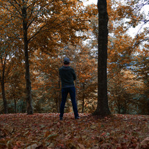man trekking in the mountain in autumn season