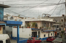 overhead wires and homes in small town in mexico