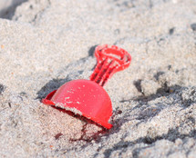 shovel in the sand 
