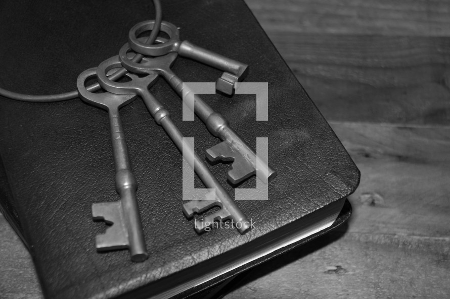 skeleton key on the cover of a Bible 