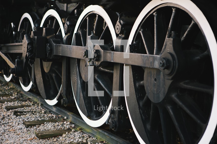 wheels of a train on the track. 