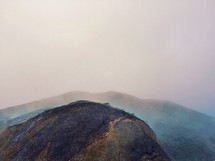 fog over a mountain peak 