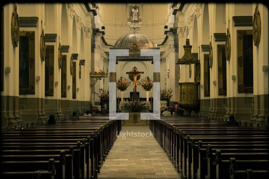interior of a Guatemala cathedral - altar, pews, aisle 