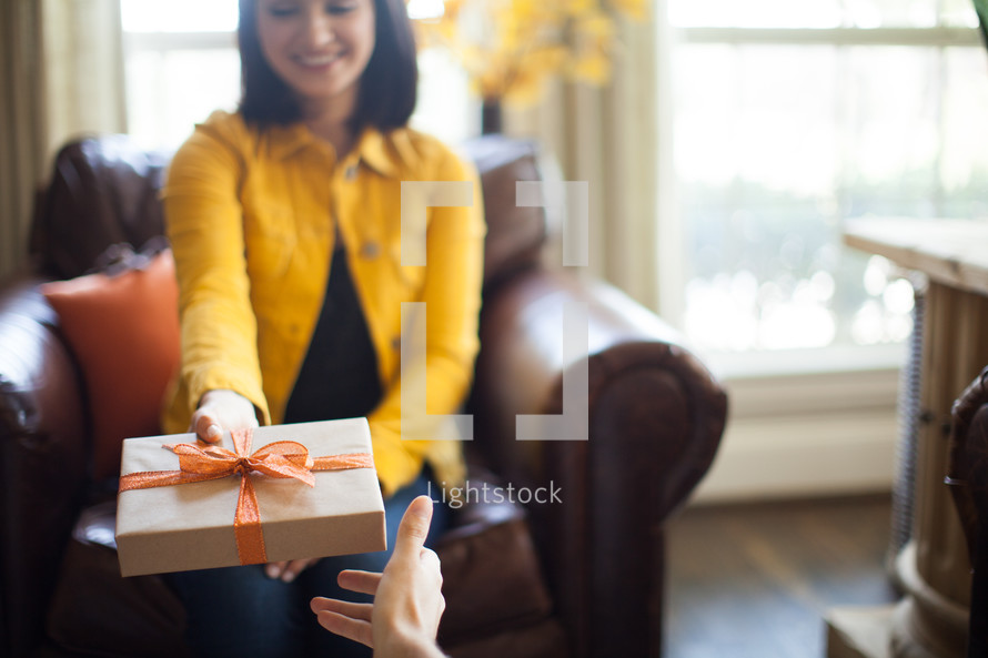 a couple exchanging gifts 