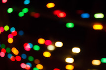 colorful bokeh lights against black 