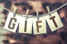 word gift on a clothesline 